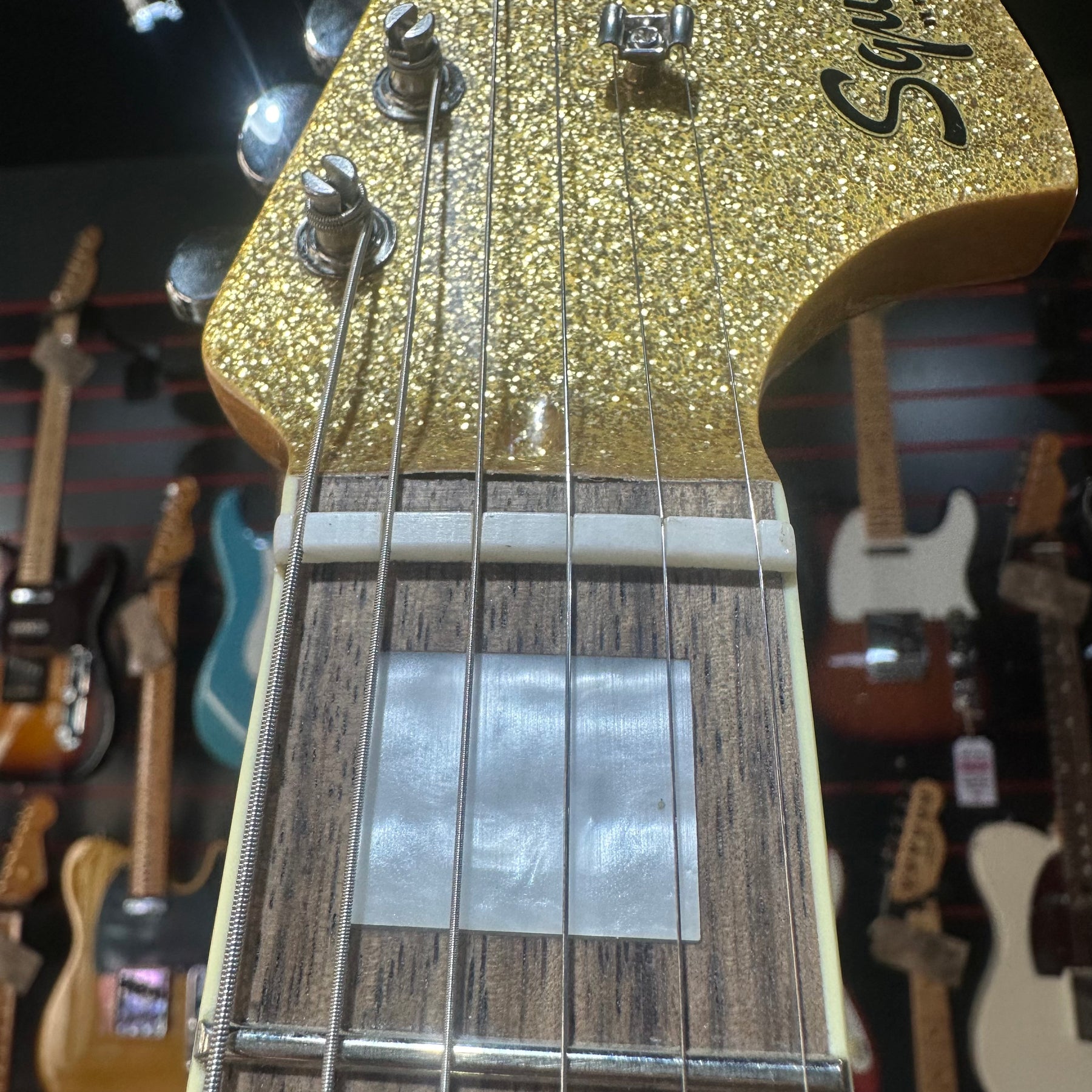 Squier Limited Edition Classic Vibe '70s Jaguar - Gold Sparkle with Matching Headstock - B-STOCK